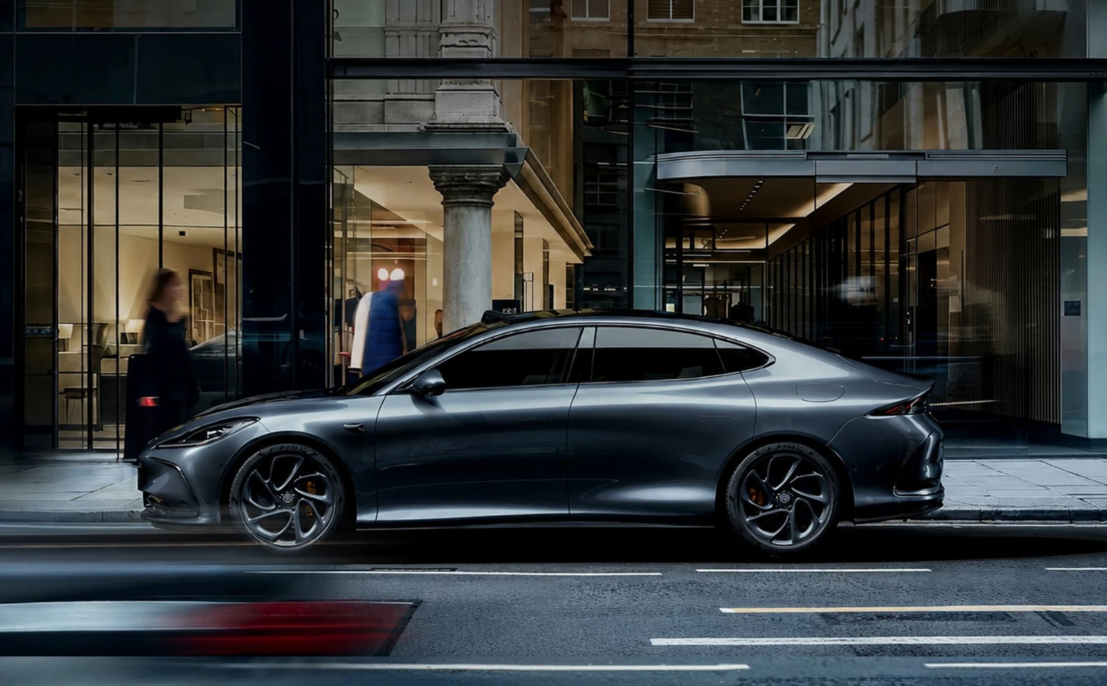 Vehicle outside a city building, from Momenta's official product imagery