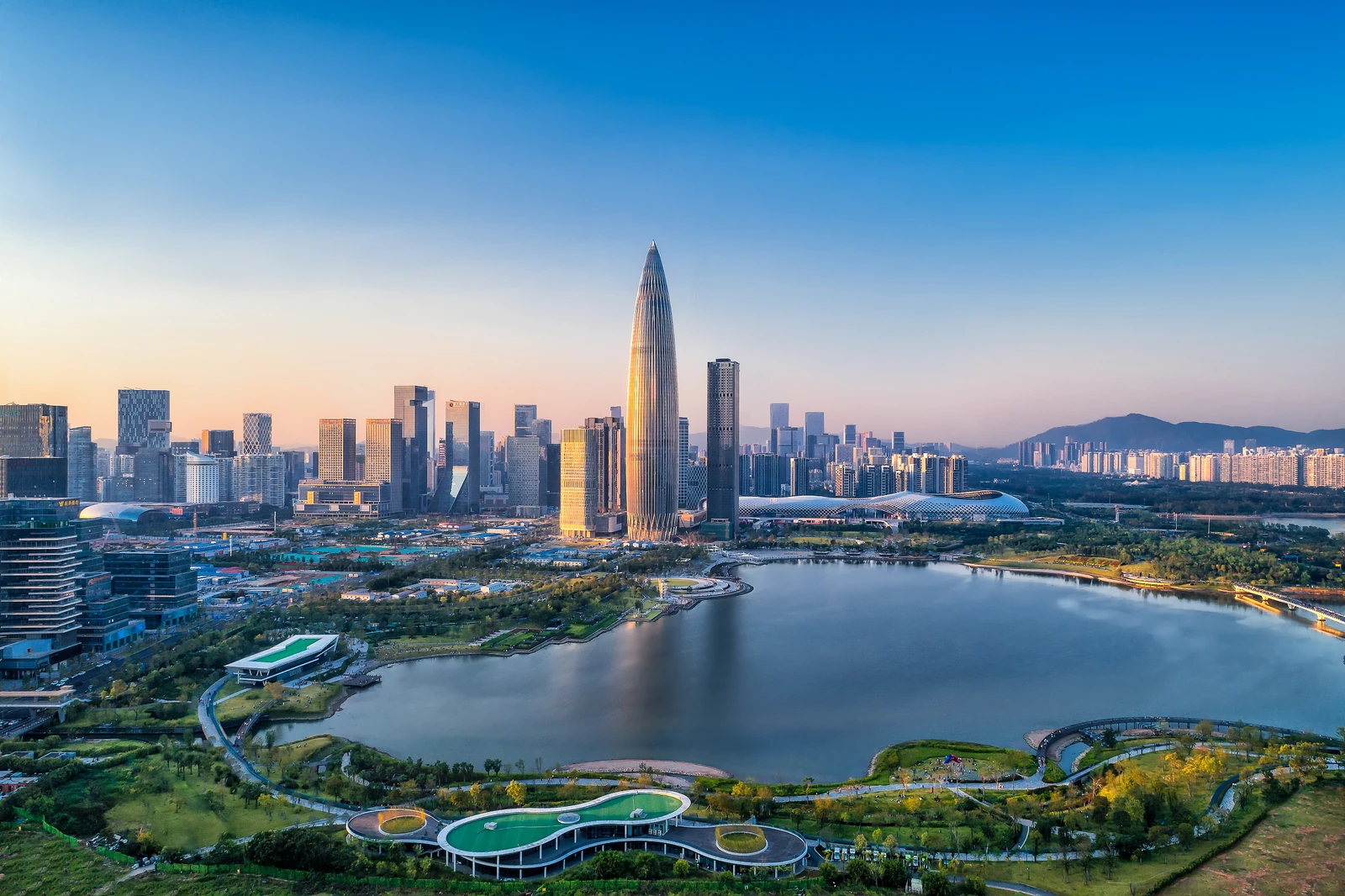 Shenzhen Bay skyline and waterfront park in evening light